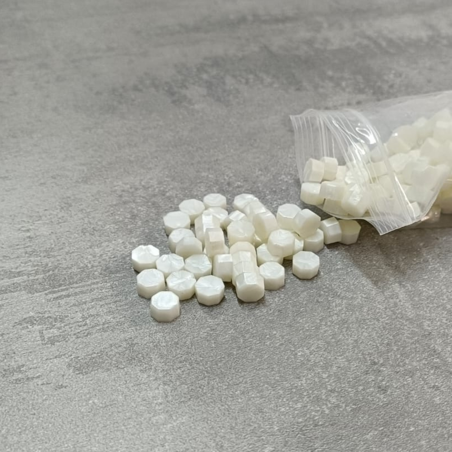 cera-in-grani-bianco-perla